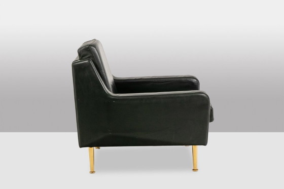 Image 1 of Airborne. Een paar groene leren fauteuils. Jaren 50.