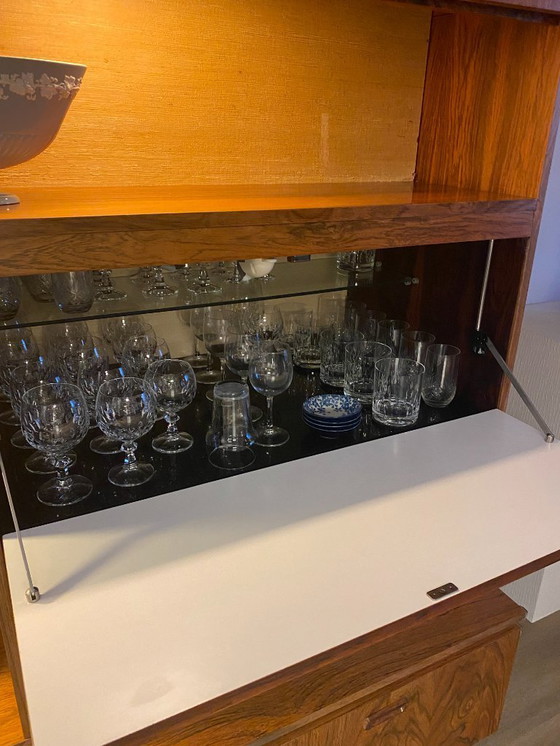 Image 1 of Mid-century wall unit / highboard with lighting, pull-out TV section and bar.