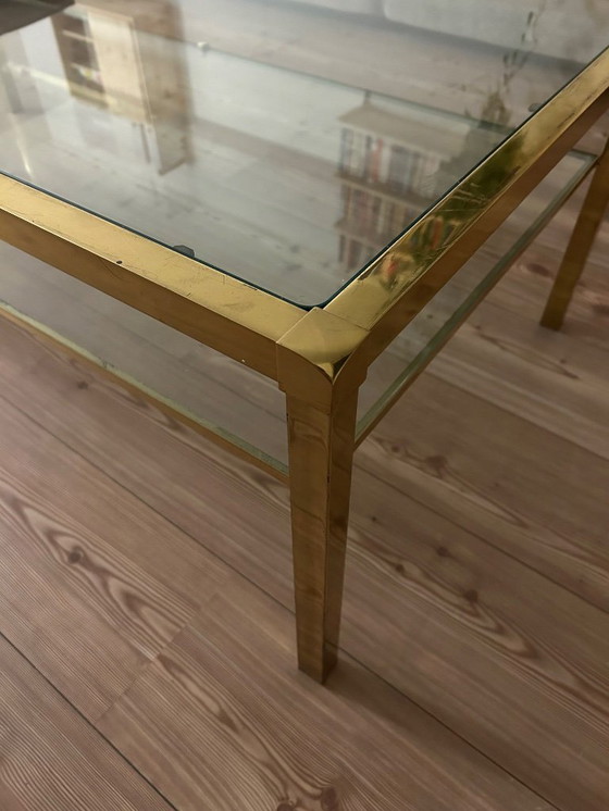 Image 1 of Hollywood Regency style coffee table in glass and gold