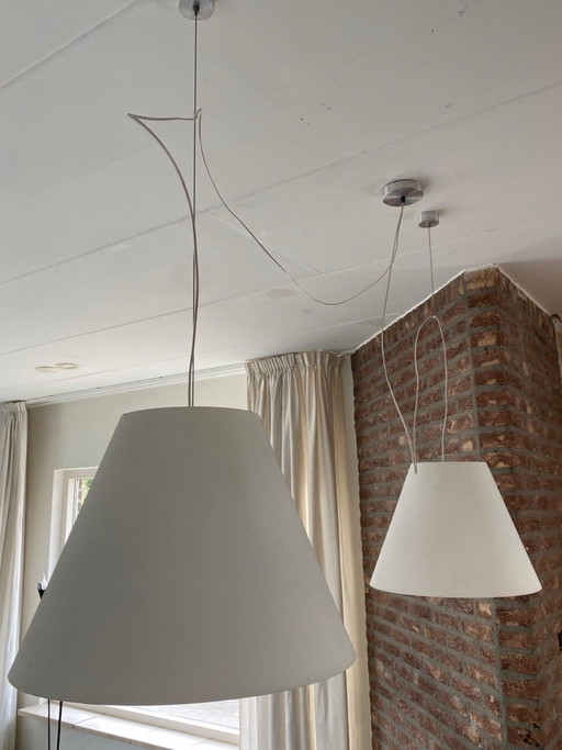 Twee Luceplan Costanza hanglampen