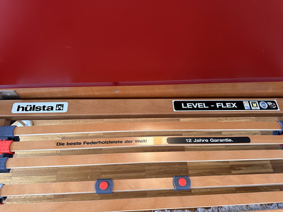 Image 1 of Letto 180 x 200 in legno massello con piedini in acciaio inox e rete a doghe.