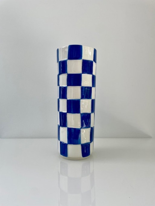 Blue and white vase with embossed diamond pattern