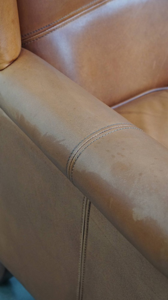 Image 1 of 2x Rundleren oorfauteuil afgewerkt met siernagels