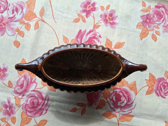Image 1 of Cool brown cast iron vase.