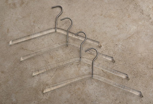 Four 70's Polycarbonate clothes hangers