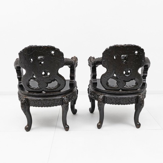 Image 1 of Pair of Chinese Qing Dynasty Carved Dragon Armchairs, Ebonized Hardwood, 19th