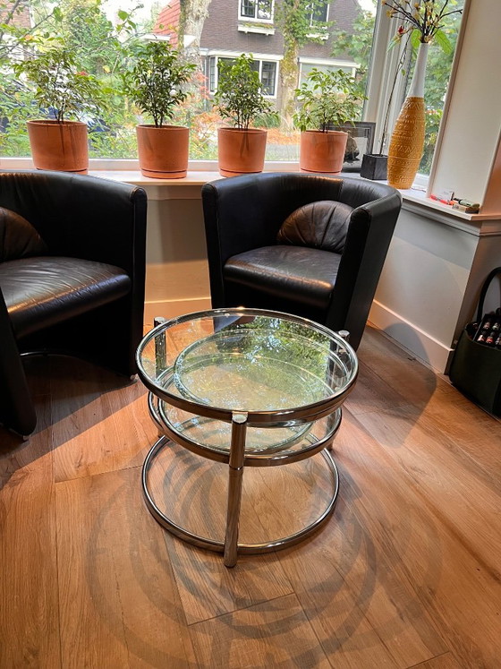 Unique vintage Italian coffee table with chrome frame and four round glass tops. Three outer tops can be (photo 10 of 10)