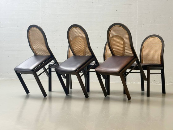 Image 1 of Set van 6 stoelen met rieten en lederen zittingen van Dietiker, jaren 80.