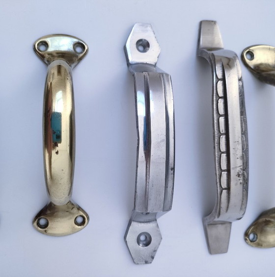 Image 1 of sette maniglie Art Déco in argento e ottone