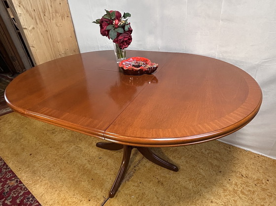 Image 1 of Mid-Century Retro Vintage Teak Extending Round Dining Table by Parker Knoll – 1970  Elegant | Space-Saving | Practical | Iconic 