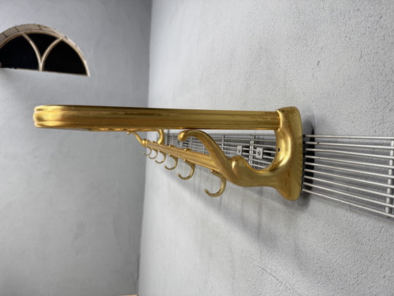 Image 1 of Vintage metalen wandkapstok met touw