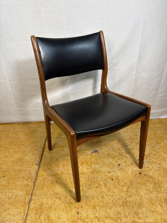 Image 1 of Mid-Century Retro Set of 8 Dining Chairs by Johannes Andersen for Uldum Møbelfabrik 1960  Elevate your dining space with this st