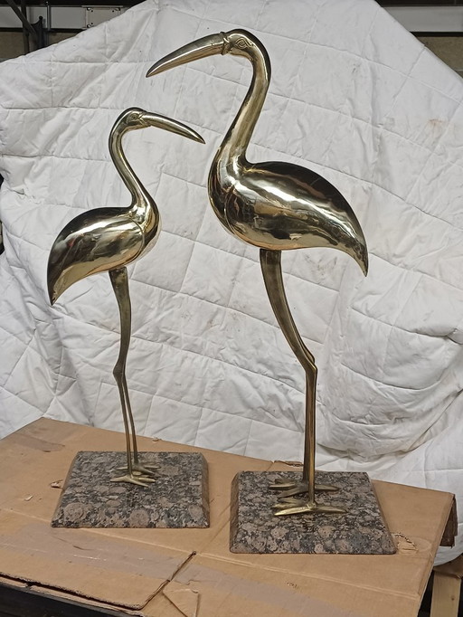 Statues de flamants roses en laiton