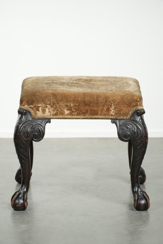Image 1 of Antiek Hollands zitje/ hocker uit de 18e eeuw met velours stof, mooi houtsnijwerk en klauwpoten