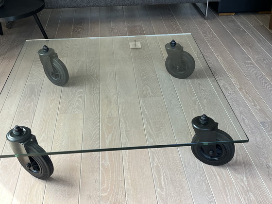Image 1 of Fontana Arte glazen salontafel op wielen
