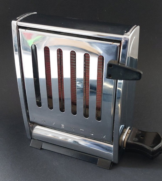 Image 1 of Two Inventum vintage chrome toasters