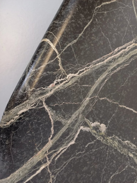 Image 1 of Vintage oval coffee table in black marble from the 1970s