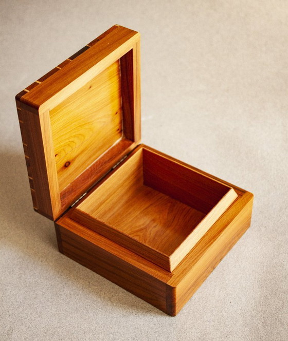 Image 1 of Tropical wood box, leather-style, handmade with orange wood inlay. Jewelry box. Multipurpose box.