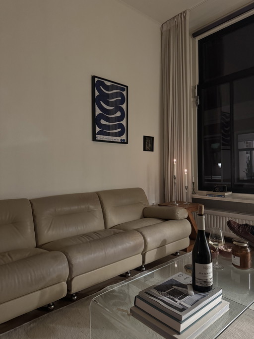 Sofá vintage de cuero color crema