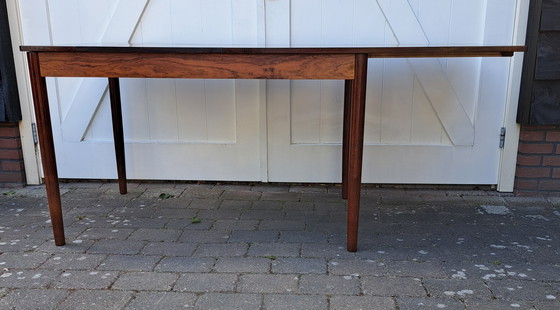 Image 1 of Mesa de comedor de diseño danés en madera de palisandro.