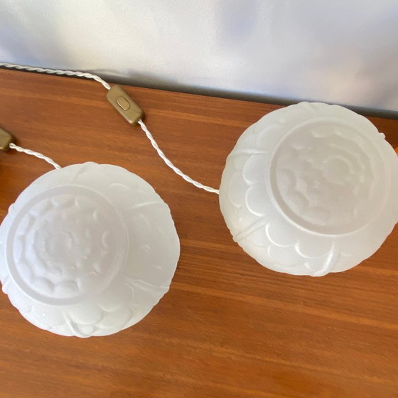 Image 1 of Pair of vintage bedside lamps with antique glass globes and brass bases, circa 1950