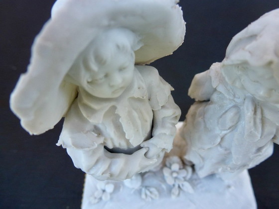 Image 1 of Luxury sponge porcelain figurine with gold leaf finish.