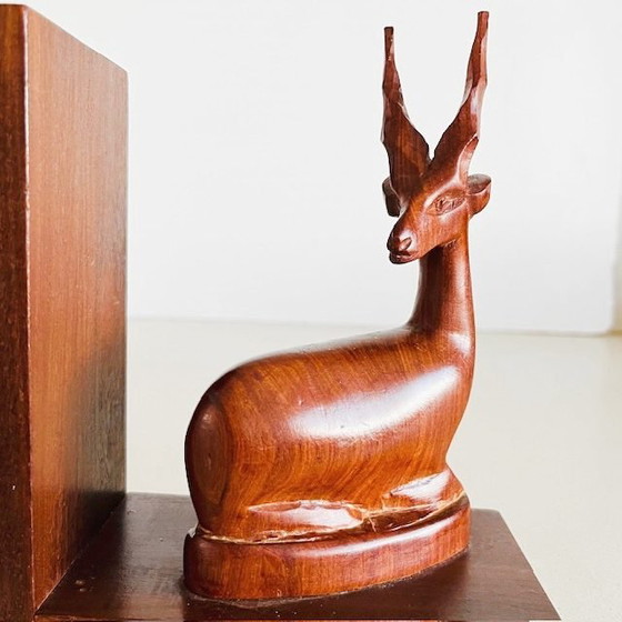 Image 1 of Vintage mid-century hand-carved wooden antelope bookend, 1970s