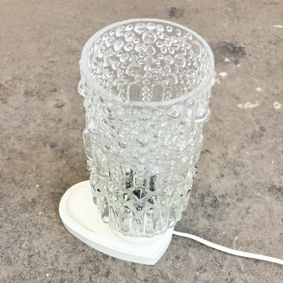 Image 1 of tafellamp van SAKU, glazen zak op kunststof voet, jaren 1970