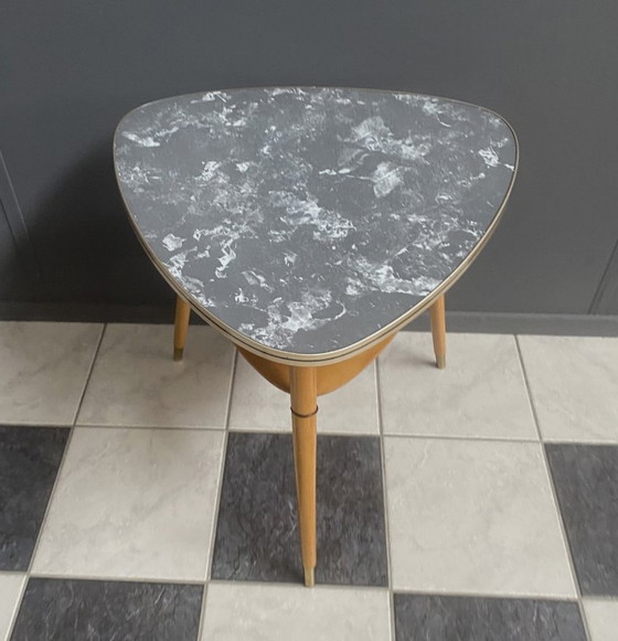 Image 1 of plectrum shaped 1960s formica coffee table