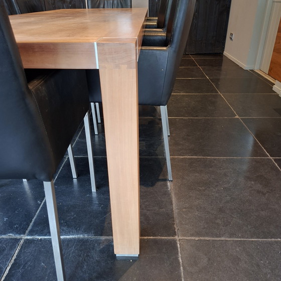 Image 1 of Malofancon dinning table, incl 8 leather chairs.