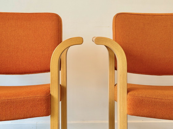 Image 1 of Juego de 2 sillas Magnus Olesen naranjas, Dinamarca, años 70 
