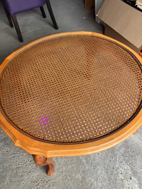 Vintage oval coffee table in French Louis XV style is made of cherry wood and features a glass top over (photo 3 of 8)