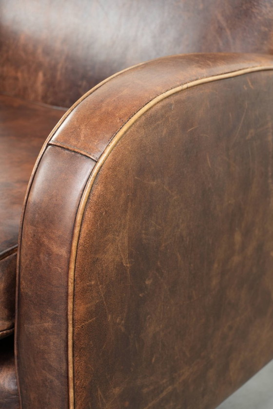 Image 1 of Sessel aus Schaffellleder mit wunderschönem, zeitlosem Design und herrlich warmen Farben