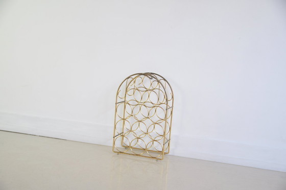 Image 1 of portabottiglie in metallo dorato