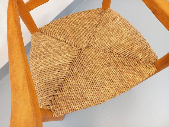 Image 1 of Vintage fauteuil van beukenhout en stro uit de jaren 50.