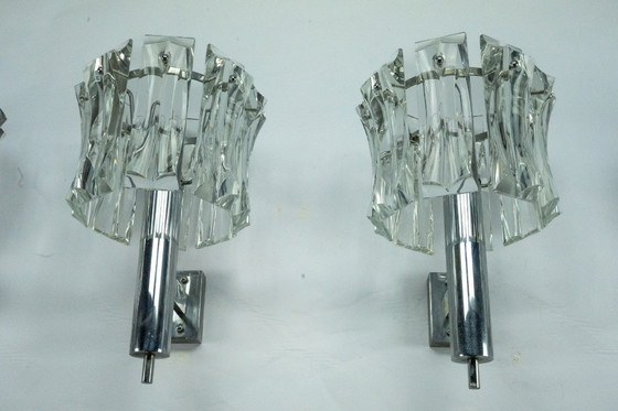 Image 1 of Ensemble de quatre grandes appliques en verre de Murano et en laiton chromé, Italie, années 1960.