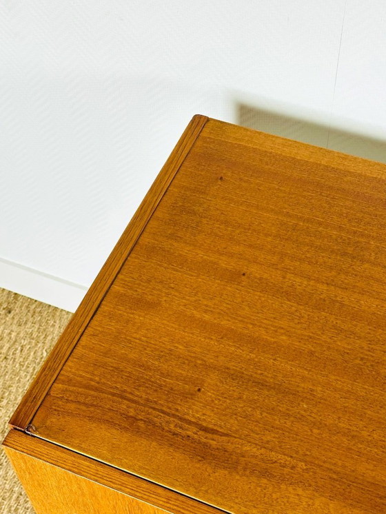 Image 1 of Minimalist Scandinavian sideboard in teak with black metal legs, 1960