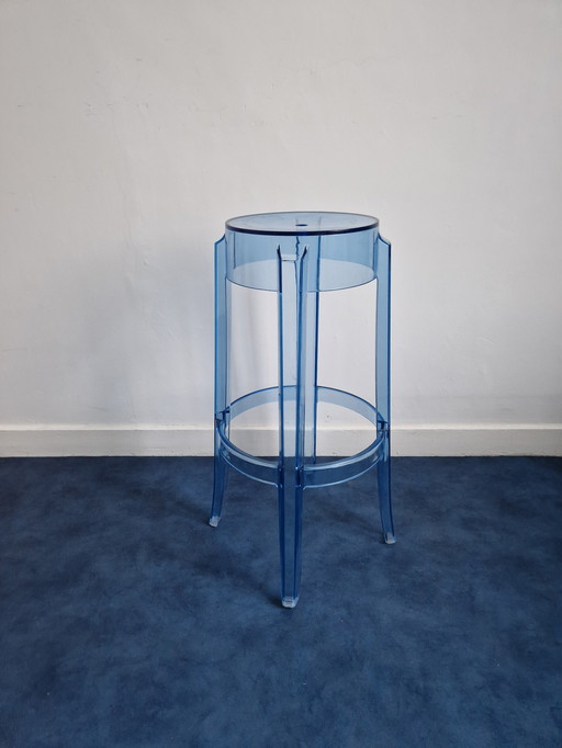 Transparent stool with plant side table