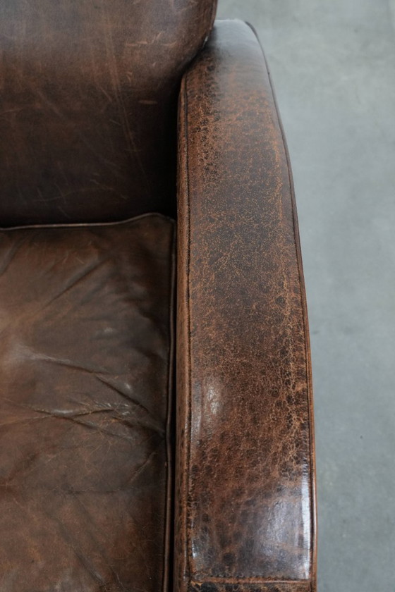 Image 1 of Vintage schapenleren armchair met een ronde vormgeving 