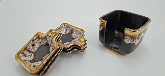 Image 1 of Set of 6 ceramic ashtrays and ashtray holders