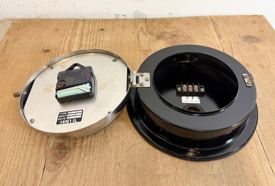 Image 1 of Vintage zwarte Hanil scheepswandklok, jaren 80