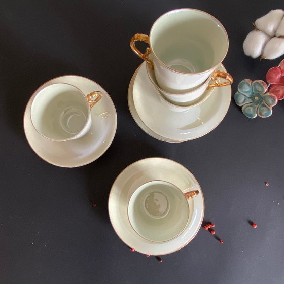 Image 1 of 5 antique porcelain espresso cups in aqua green and gold trim