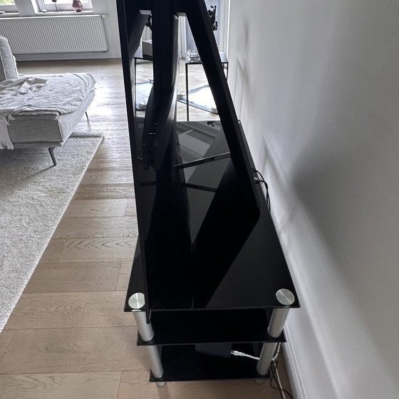 Image 1 of Black glass TV table