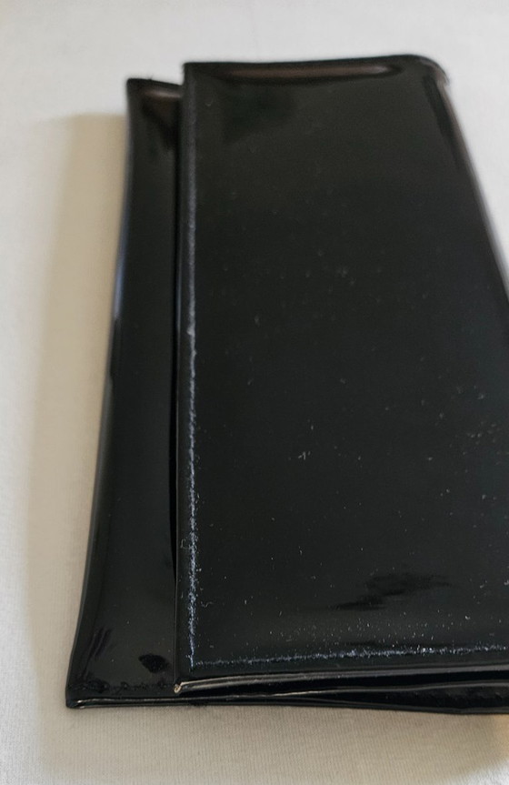 Clutch Yves Saint Laurent in pelle verniciata nera, Plastica, Nero (foto 13 di 15)