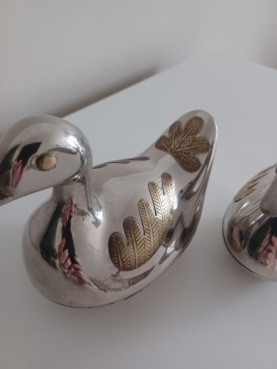 Image 1 of Vintage koppel tinnen eendjes met koper. Opbergdoosjes.