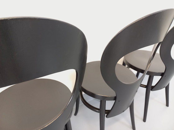 Image 1 of Set van 4 vintage Baumann Mouette stoelen in zwart hout uit de jaren 70.