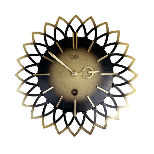 Mechanical sun hanging clock, Müller, Germany, 1960s.