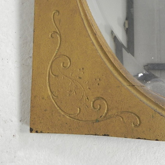 Image 1 of Gold oval mirror with cut edge, 1950s
