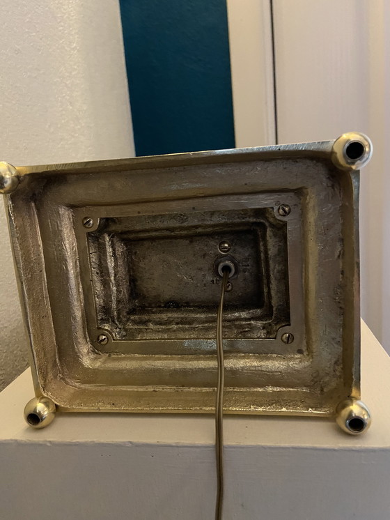 Image 1 of Bronze table lamp depicting a cherub playing the guitar