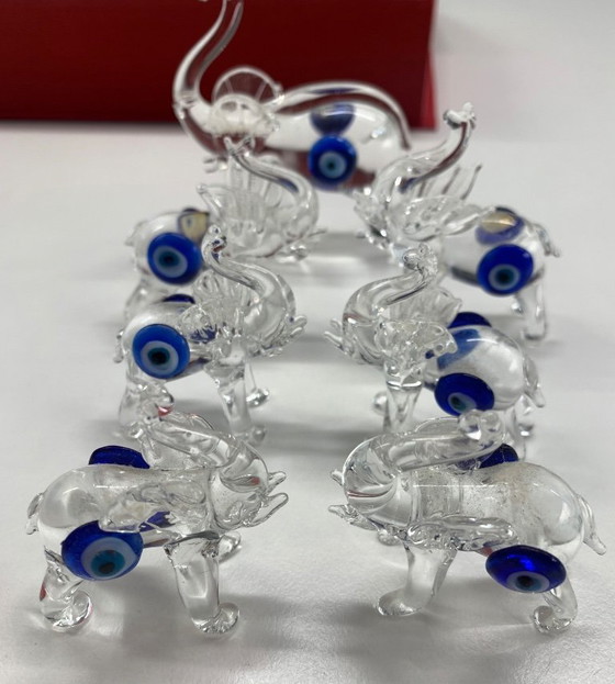 Image 1 of Famiglia di elefanti dagli occhi azzurri in confezione regalo